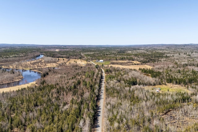 291 River Rd, Milo, ME 04463 - drone / aerial view with a water view and a wooded view