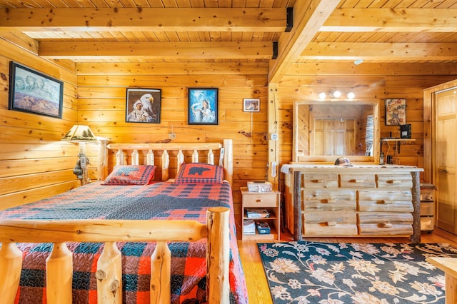 291 River Rd, Milo, ME 04463 - bedroom with wooden ceiling, wood-type flooring, and beam ceiling