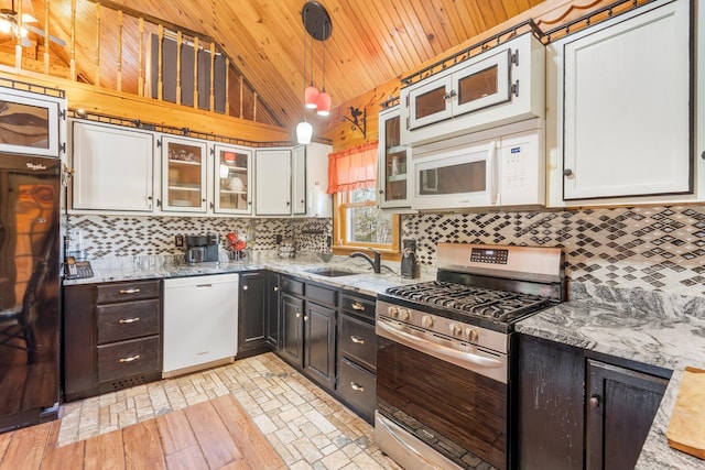 291 River Rd, Milo, ME 04463 - kitchen with wood ceiling, a sink, white appliances, decorative backsplash, and lofted ceiling