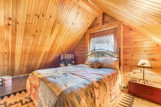 291 River Rd, Milo, ME 04463 - bedroom with wooden walls, wood ceiling, vaulted ceiling with beams, and wood finished floors