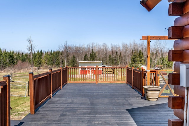291 River Rd, Milo, ME 04463 - deck featuring a forest view