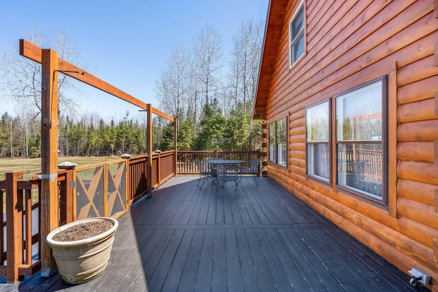 291 River Rd, Milo, ME 04463 - wooden terrace featuring outdoor dining space