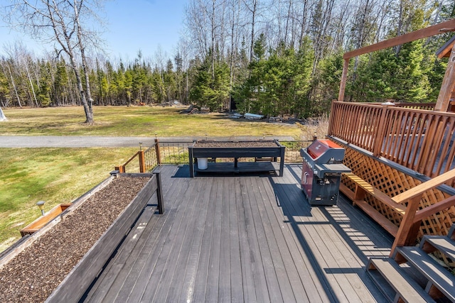 291 River Rd, Milo, ME 04463 - wooden deck with area for grilling and a lawn