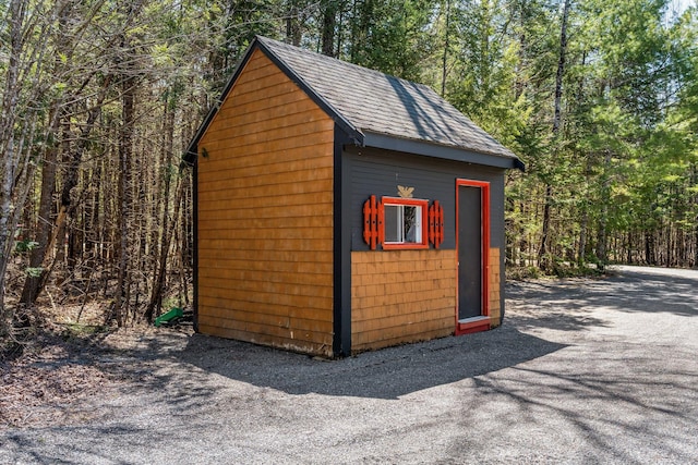 291 River Rd, Milo, ME 04463 - view of shed featuring a wooded view
