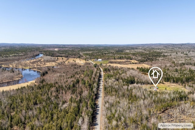 291 River Rd, Milo, ME 04463 - birds eye view of property featuring a water view and a wooded view