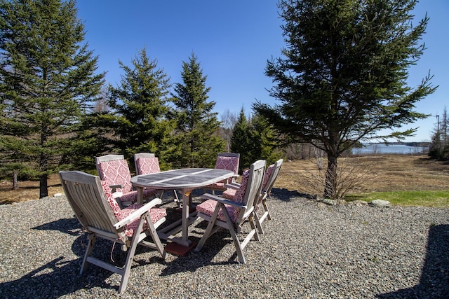view of yard with outdoor dining area