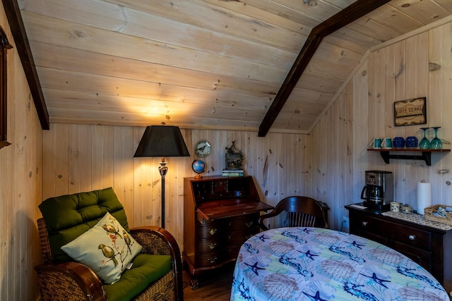 bedroom with wooden ceiling, vaulted ceiling, wood finished floors, and wooden walls