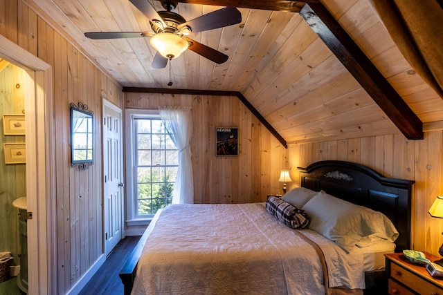 bedroom featuring vaulted ceiling, wooden walls, wood ceiling, and wood finished floors