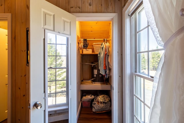 doorway featuring a healthy amount of sunlight and wood finished floors