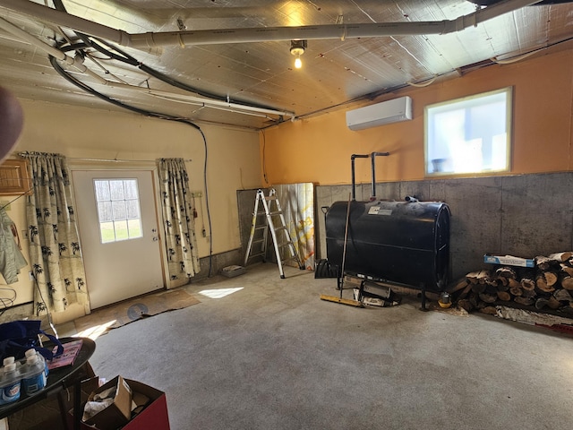 below grade area with heating fuel and a wall unit AC