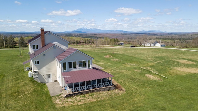 bird's eye view featuring a mountain view
