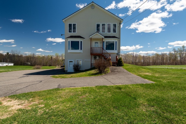 view of front of house with a front lawn