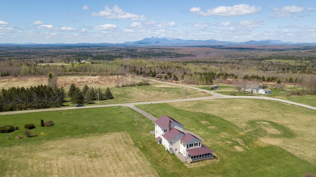 bird's eye view featuring a rural view and a mountain view