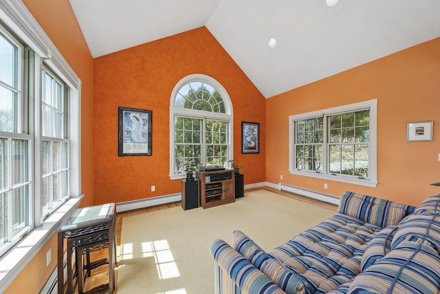 living area with baseboards, a baseboard radiator, and high vaulted ceiling
