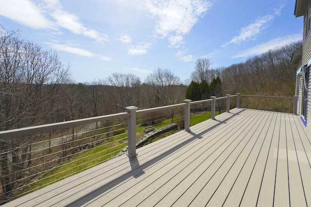 deck with a wooded view