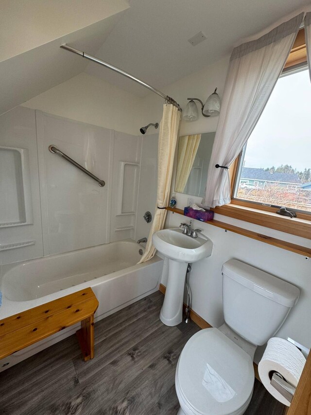 10 Wharf St, Jonesport, ME 04649 - full bathroom with toilet, baseboards, wood finished floors, and shower / bath combo