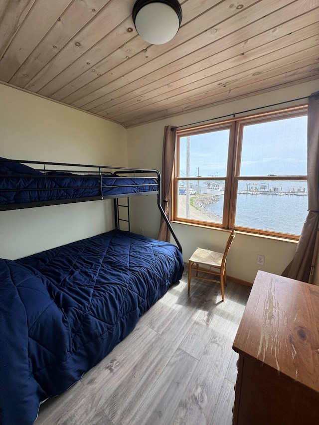 10 Wharf St, Jonesport, ME 04649 - bedroom with wooden ceiling and wood finished floors