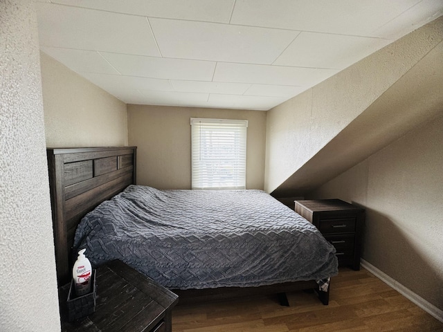26 Hammond St, Caribou, ME 04736 - bedroom with a textured wall and wood finished floors