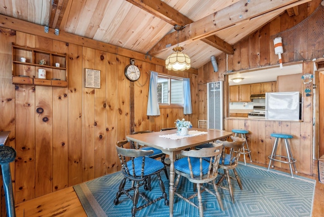 89 14th St, Shapleigh, ME 04076 - dining room with wooden ceiling, wood walls, and lofted ceiling with beams