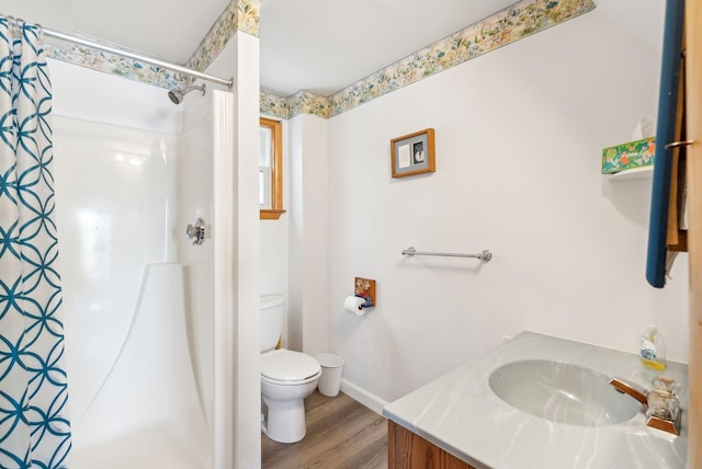 89 14th St, Shapleigh, ME 04076 - bathroom featuring toilet, baseboards, a shower with shower curtain, vanity, and wood finished floors