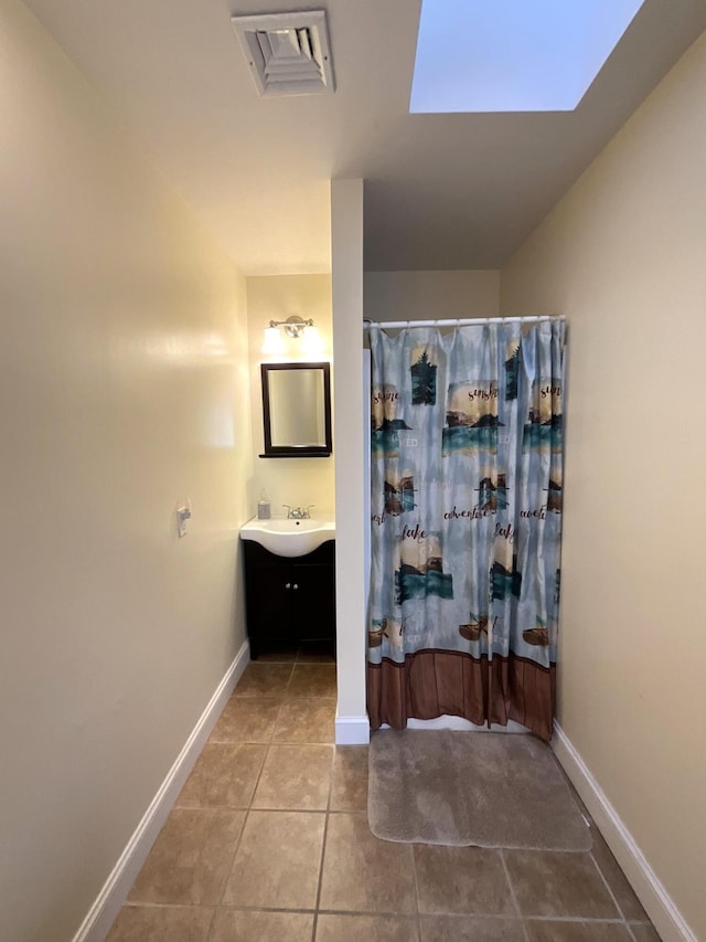 150 Birchwood Rd, Gray, ME 04039 - full bath featuring visible vents, vanity, curtained shower, baseboards, and tile patterned floors