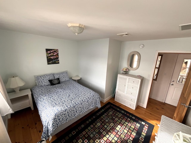 150 Birchwood Rd, Gray, ME 04039 - bedroom featuring baseboards, hardwood / wood-style flooring, and visible vents