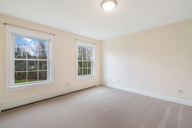 104 Main Trl, Hampden, ME 04444 - spare room with a baseboard heating unit, baseboards, and carpet flooring