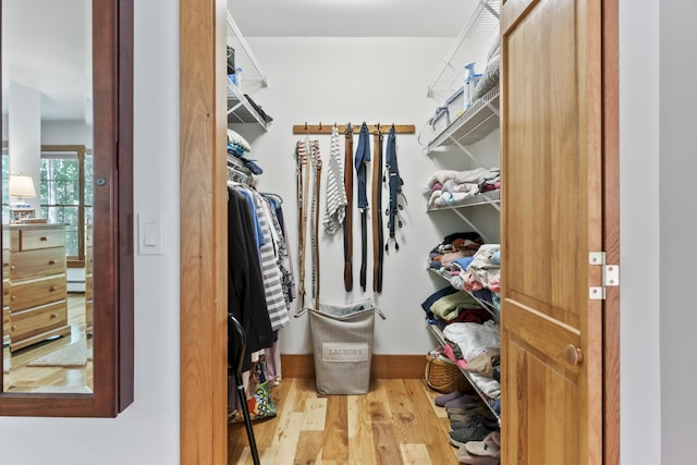 1515 Old Augusta Rd, Waldoboro, ME 04572 - walk in closet featuring a baseboard heating unit and wood finished floors