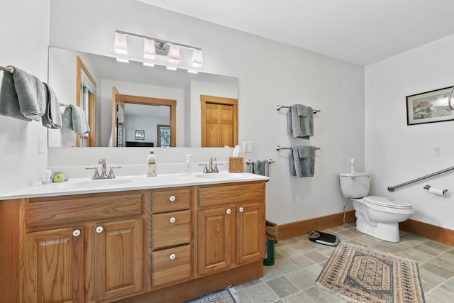 1515 Old Augusta Rd, Waldoboro, ME 04572 - full bath with a sink, baseboards, and toilet