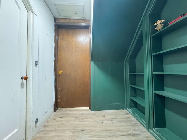 bonus room featuring wood finished floors