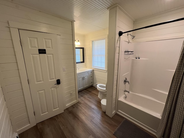 6 Gully Brook Ln, Orland, ME 04472 - full bath with wood finished floors, toilet, vanity, shower / bath combo, and wood walls