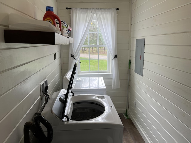6 Gully Brook Ln, Orland, ME 04472 - clothes washing area featuring wooden walls, dark wood-type flooring, and electric panel