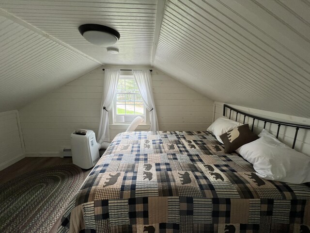 6 Gully Brook Ln, Orland, ME 04472 - bedroom featuring lofted ceiling and wood finished floors