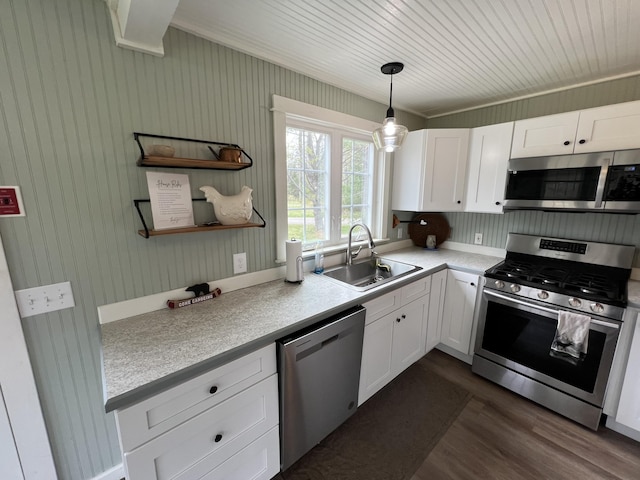 6 Gully Brook Ln, Orland, ME 04472 - kitchen featuring stainless steel appliances, a sink, white cabinets, light countertops, and dark wood-style flooring