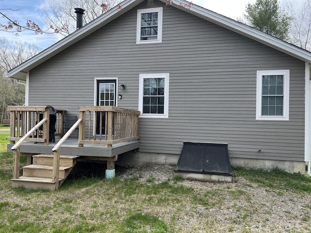 6 Gully Brook Ln, Orland, ME 04472 - back of property with a deck