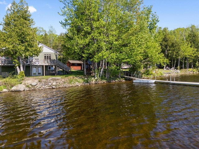 32 Whites Pond Rd, Palmyra, ME 04965 - water view with stairway