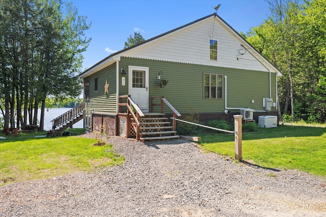 32 Whites Pond Rd, Palmyra, ME 04965 - view of front of house featuring a front yard