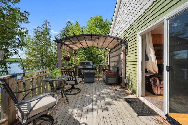 32 Whites Pond Rd, Palmyra, ME 04965 - wooden terrace featuring a water view