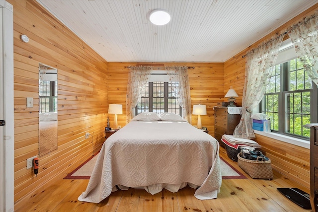 32 Whites Pond Rd, Palmyra, ME 04965 - bedroom featuring wood walls, hardwood / wood-style floors, and wood ceiling