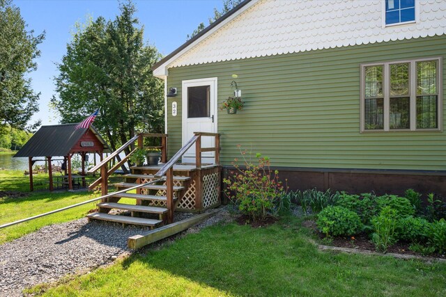 32 Whites Pond Rd, Palmyra, ME 04965 - doorway to property with a yard