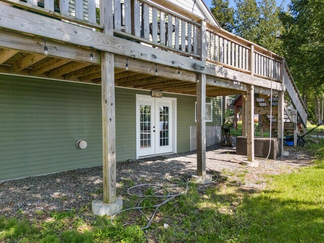 32 Whites Pond Rd, Palmyra, ME 04965 - rear view of property with a deck, french doors, and central air condition unit