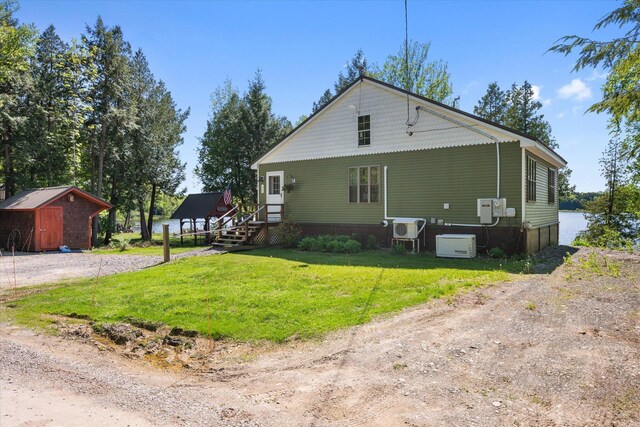 32 Whites Pond Rd, Palmyra, ME 04965 - view of home's exterior featuring a yard and driveway