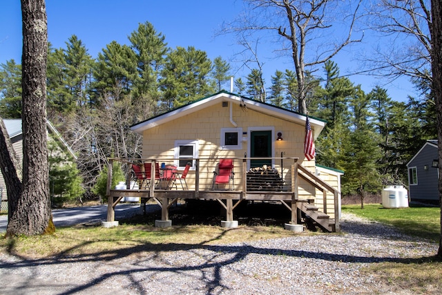view of front of home featuring a wooden deck