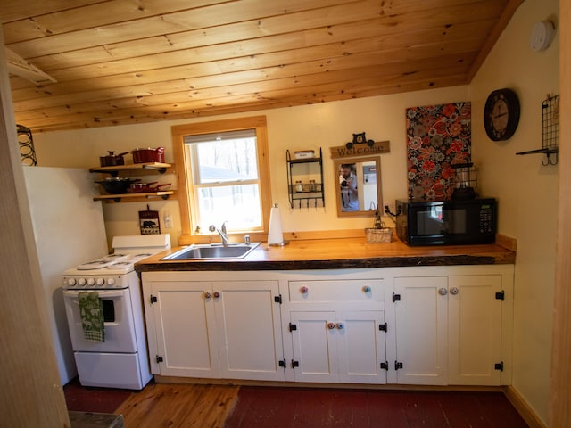kitchen with white range with gas stovetop, black microwave, a sink, wooden ceiling, and white cabinetry