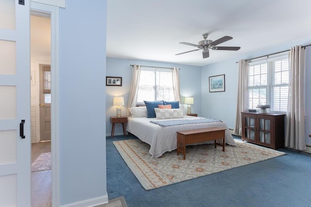 107 Elm St, Farmington, ME 04938 - bedroom with a ceiling fan and carpet