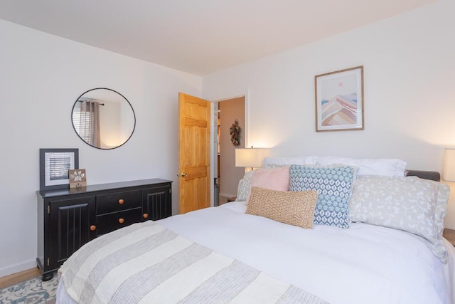 107 Elm St, Farmington, ME 04938 - bedroom featuring wood finished floors and baseboards