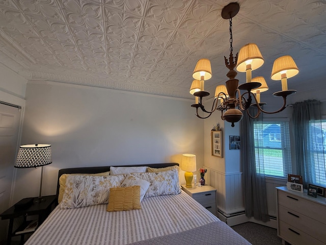 412 N Lubec Rd, Lubec, ME 04652 - bedroom with a chandelier, ornamental molding, and an ornate ceiling