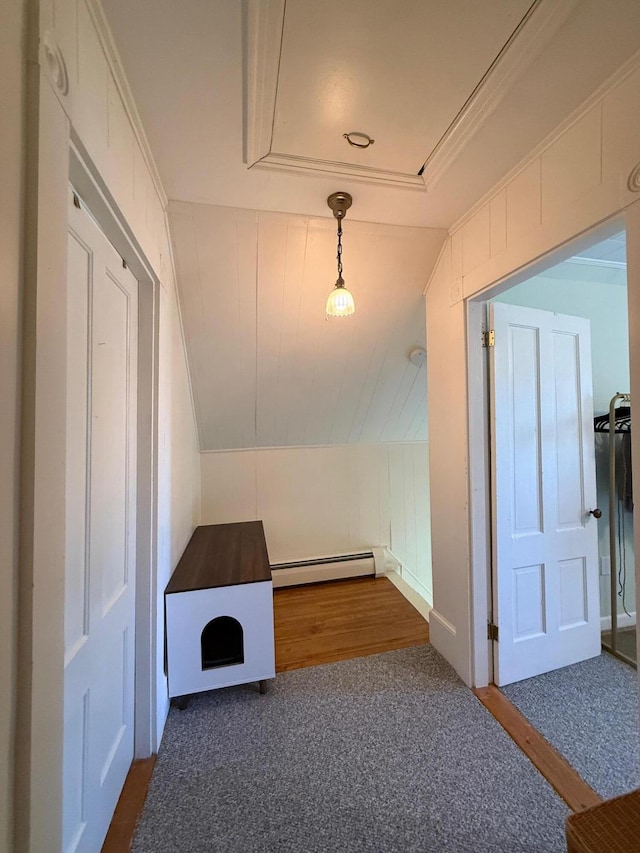 412 N Lubec Rd, Lubec, ME 04652 - bonus room featuring a baseboard radiator, lofted ceiling, dark carpet, and attic access