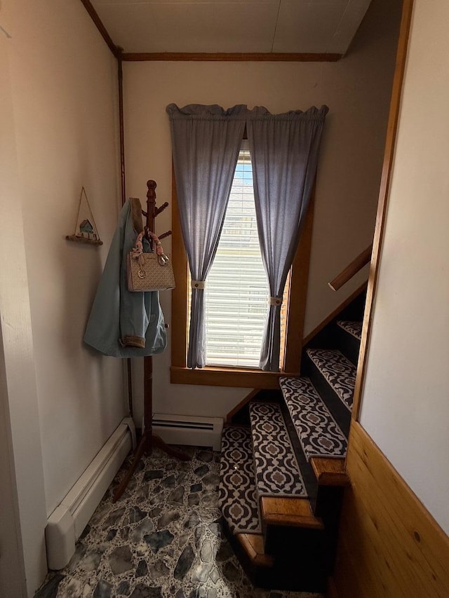 412 N Lubec Rd, Lubec, ME 04652 - interior space with baseboard heating, stairs, and a baseboard heating unit