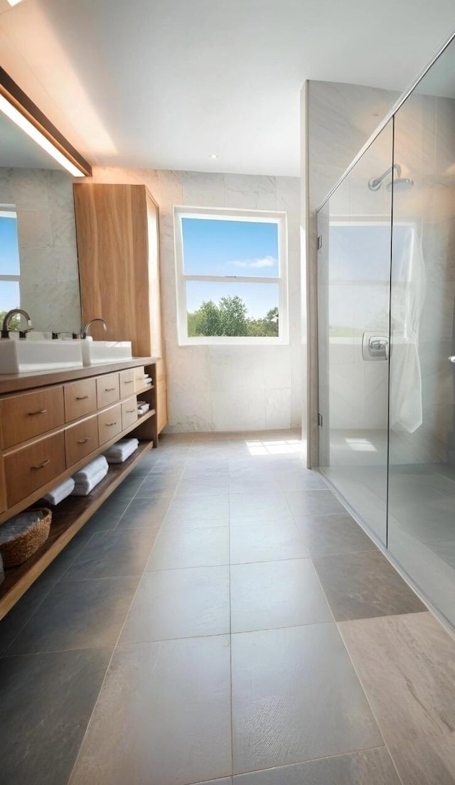 full bathroom with vanity and a stall shower
